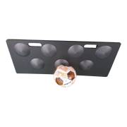 Dimpled rebound board with round dimples and two hand slots, a ball in front, on a white background