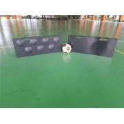Dimpled and flat rebound boards side by side on an indoor court