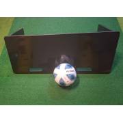 Flat rebound board on turf with a ball in front, seen from the side