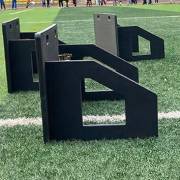 Supplier photo of three boards stacked on grass