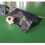 Flat rebound board tilted back on its frame with a ball, the dimpled board behind it