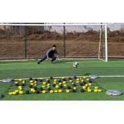 Goalkeeper diving for a ball deflected off the rebound net