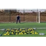 Goalkeeper in the set position behind the rebound net with all four corners held by water-filled bases