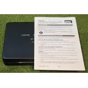 Printed Lange Skinfold Caliper operator's manual resting on the closed case