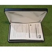Open case with the printed operator's manual lying inside