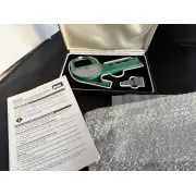 Open case with the caliper, the printed manual and bubble wrap beside it
