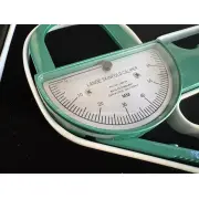 Angled close view of the dial, marked Lange Skinfold Caliper, Beta Technology, Santa Cruz, California