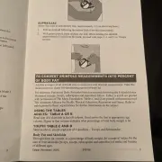 Manual pages showing the suprailiac site and how to convert skinfold totals to percent body fat