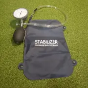 The pad before inflation, with the tube and gauge