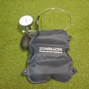 Pad, clear tube, gauge and hand bulb laid out together